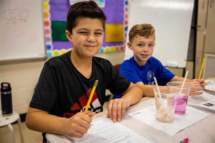 College Grove students in a science class